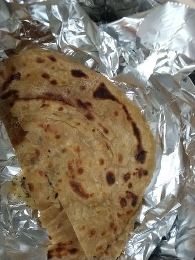 Delicious Lachha Paranthas prepared by COOX