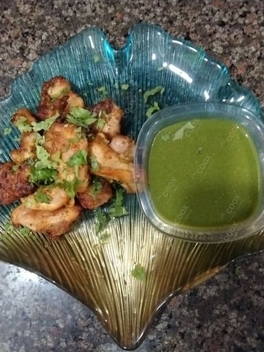 Delicious Chicken Tikka prepared by COOX