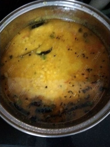 Delicious Dal Tadka prepared by COOX