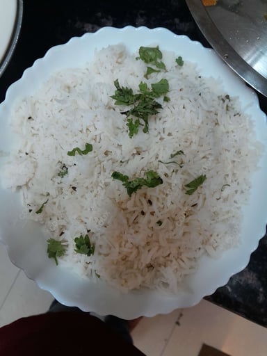 Delicious Jeera Rice prepared by COOX