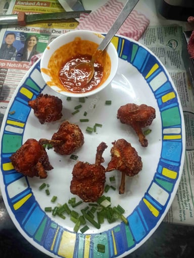 Delicious Chicken Lollipop prepared by COOX