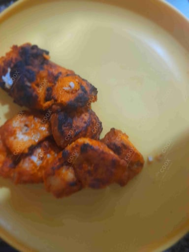 Delicious Fish Tikka prepared by COOX