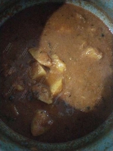 Delicious Dum Aloo prepared by COOX