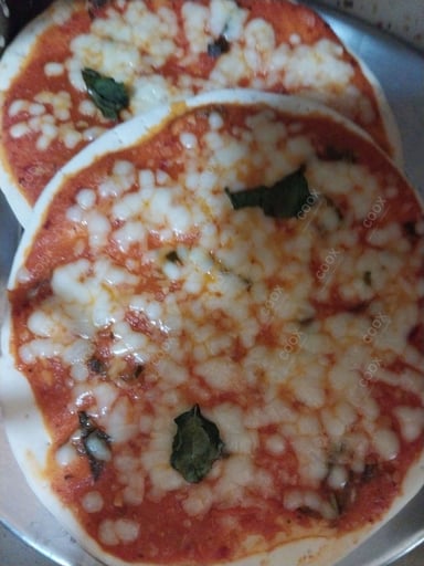 Delicious Margherita Pizza prepared by COOX