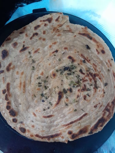 Delicious Lachha Paranthas prepared by COOX