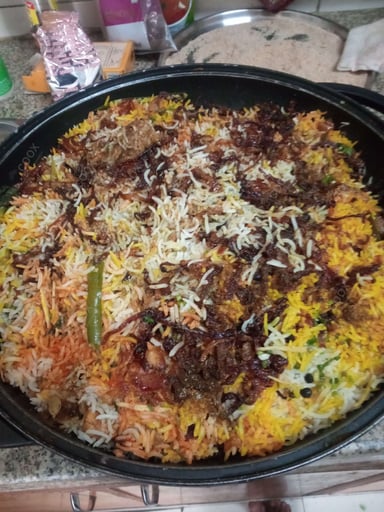 Delicious Chicken Biryani prepared by COOX