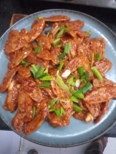 Delicious Chilli Lotus Stem prepared by COOX