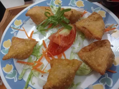 Delicious Mini Samosas prepared by COOX