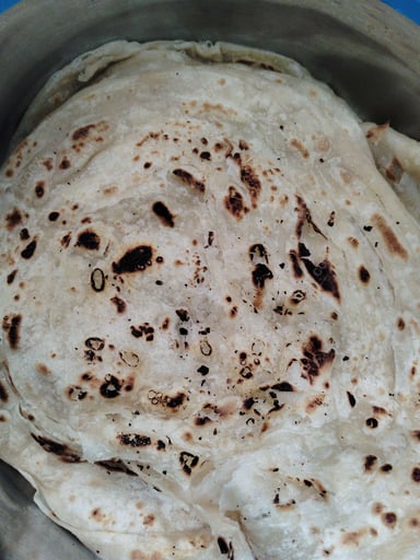 Delicious Lachha Paranthas prepared by COOX