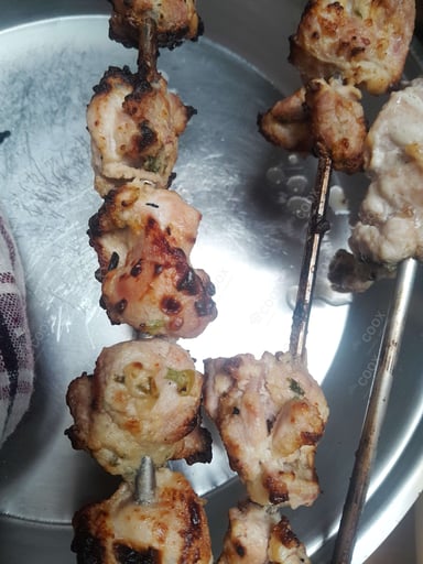 Delicious Murgh Malai Tikka prepared by COOX