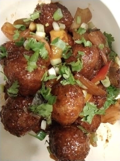 Delicious Veg Manchurian (Dry) prepared by COOX