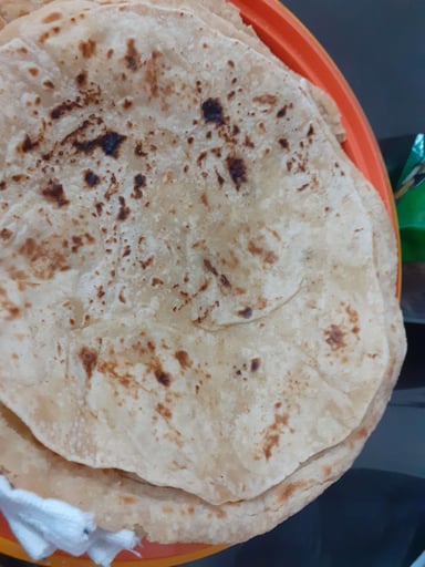 Delicious Tawa Rotis prepared by COOX