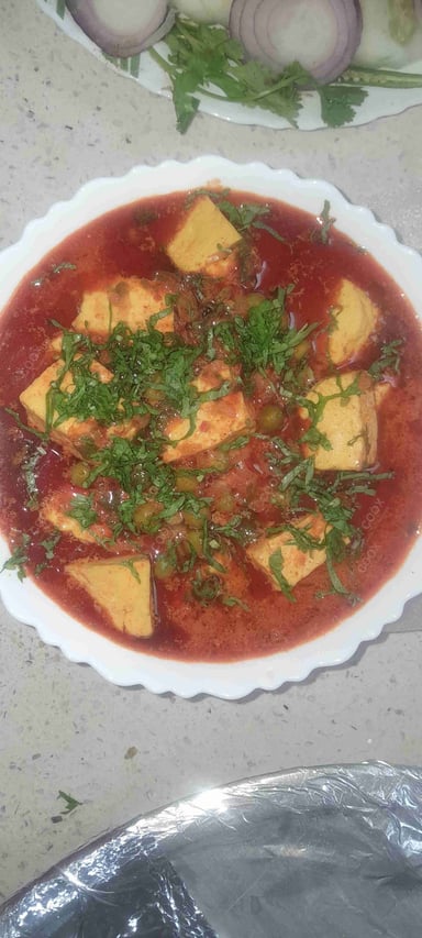 Delicious Matar Paneer prepared by COOX