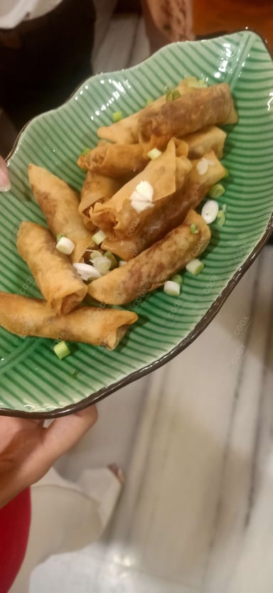 Delicious Veg Spring Rolls prepared by COOX