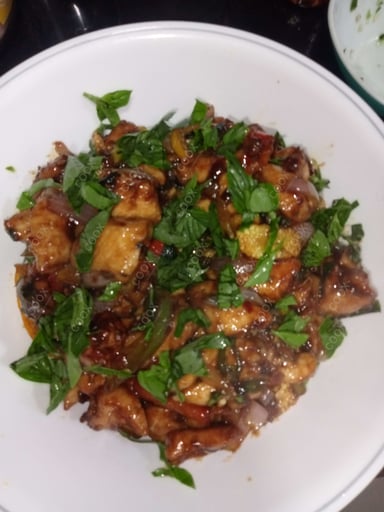 Tasty Thai Basil Chicken cooked by COOX chefs cooks during occasions parties events at home
