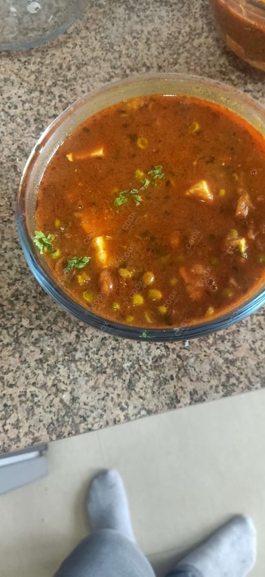 Delicious Matar Paneer prepared by COOX