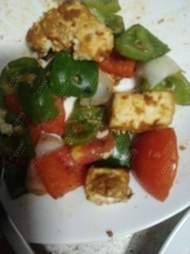 Delicious Paneer Tikka prepared by COOX