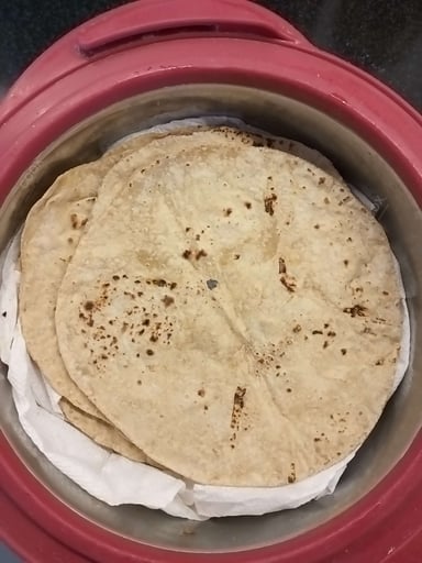 Delicious Tawa Rotis prepared by COOX