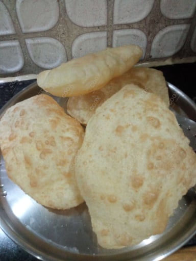 Delicious Bhature prepared by COOX