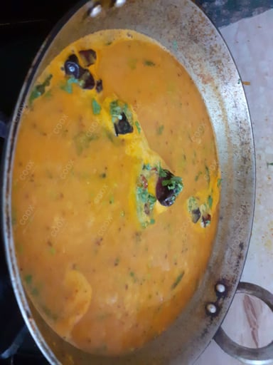 Delicious Dal Tadka prepared by COOX