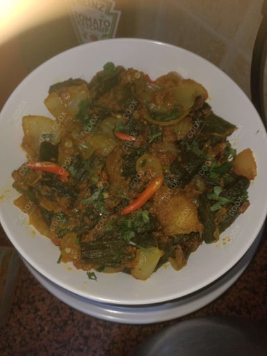 Delicious Bhindi do Pyaza prepared by COOX