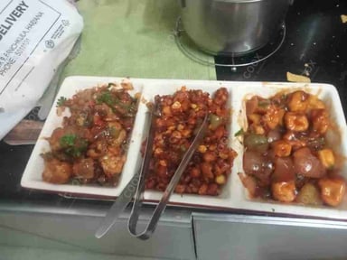 Delicious Chilli Paneer (Dry) prepared by COOX