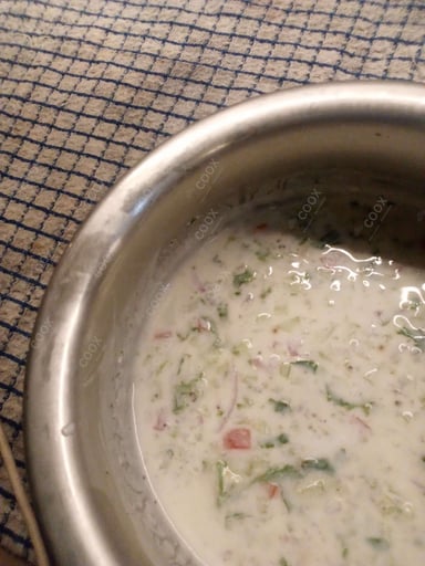 Delicious Mix Veg Raita prepared by COOX