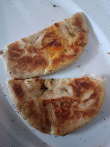 Tasty Kulcha cooked by COOX chefs cooks during occasions parties events at home