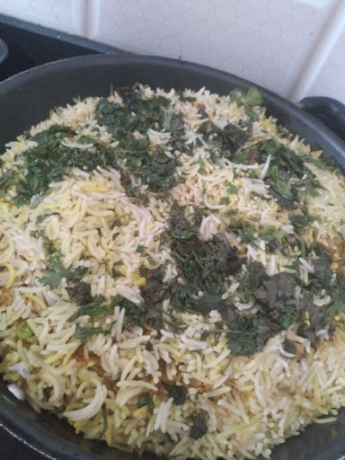 Delicious Veg Biryani prepared by COOX