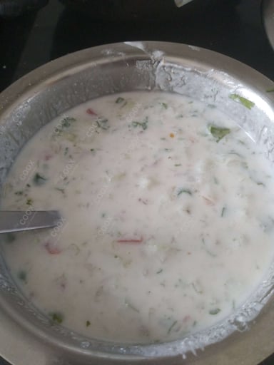 Delicious Mix Veg Raita prepared by COOX