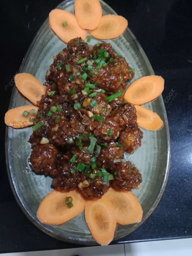 Delicious Veg Manchurian (Dry) prepared by COOX