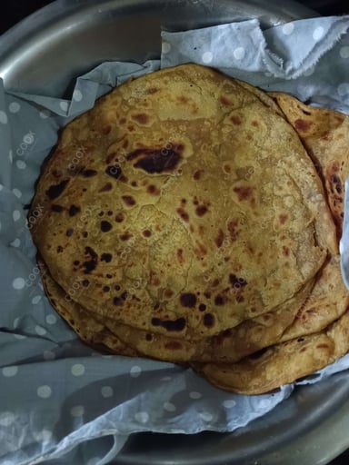 Delicious Lachha Paranthas prepared by COOX