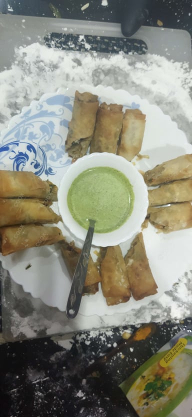 Delicious Veg Spring Rolls prepared by COOX