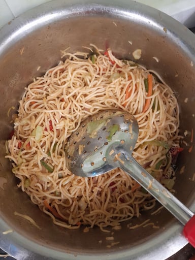 Delicious Veg Hakka Noodles prepared by COOX