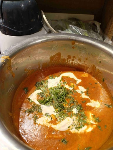 Delicious Paneer Butter Masala prepared by COOX