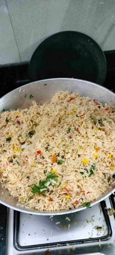 Tasty Mexican Rice cooked by COOX chefs cooks during occasions parties events at home