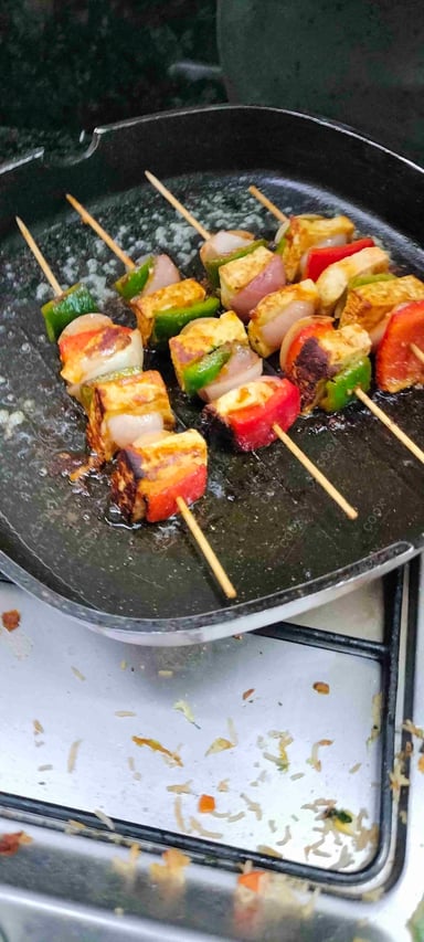 Tasty Paneer Shashlik cooked by COOX chefs cooks during occasions parties events at home