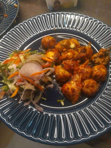 Delicious Mushroom Tikka prepared by COOX