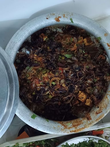 Delicious Veg Biryani prepared by COOX