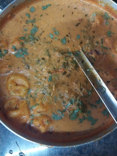 Delicious Malai Kofta (Orange Gravy) prepared by COOX