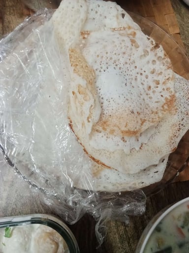 Tasty Appam cooked by COOX chefs cooks during occasions parties events at home