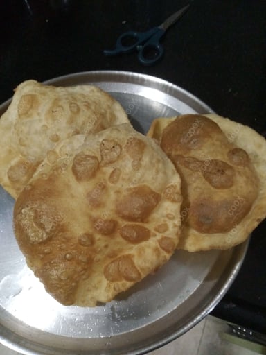 Delicious Bhature prepared by COOX