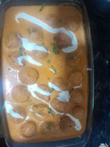 Delicious Malai Kofta (Orange Gravy) prepared by COOX