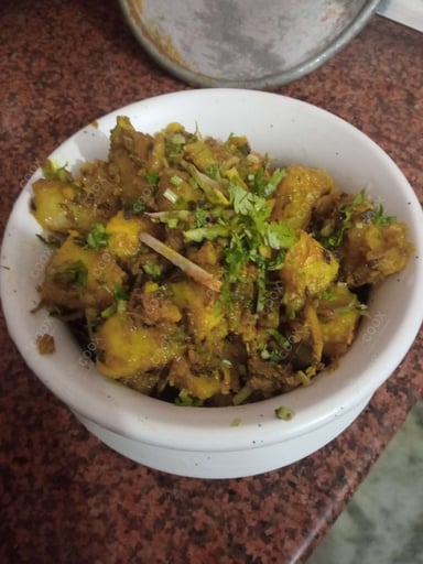 Delicious Jeera Aloo prepared by COOX