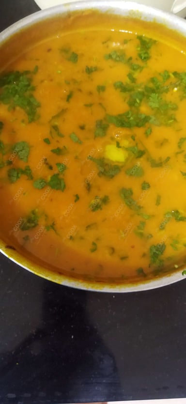 Tasty Masoor Dal  cooked by COOX chefs cooks during occasions parties events at home