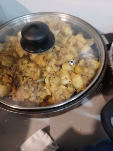 Tasty Jeera Aloo cooked by COOX chefs cooks during occasions parties events at home