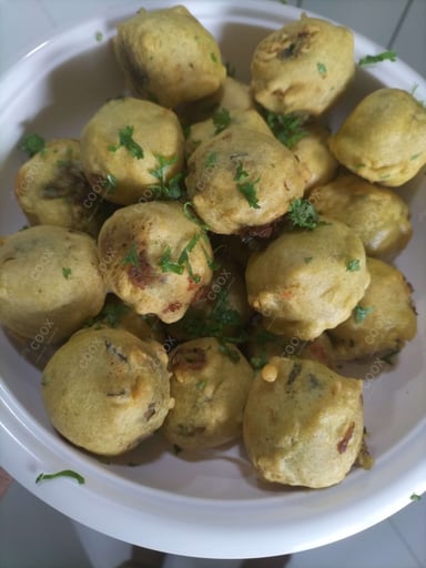 Tasty Aloo Bonda cooked by COOX chefs cooks during occasions parties events at home