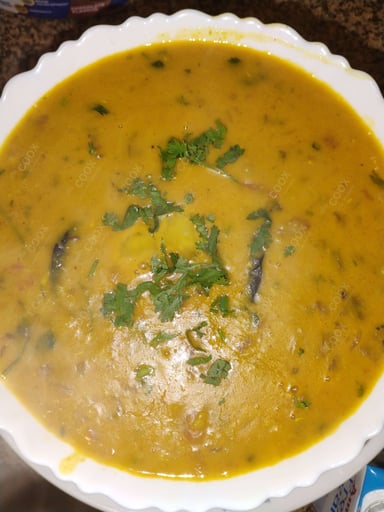 Tasty Arhar Dal cooked by COOX chefs cooks during occasions parties events at home