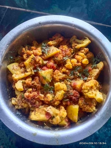 Delicious Aloo Gobhi prepared by COOX