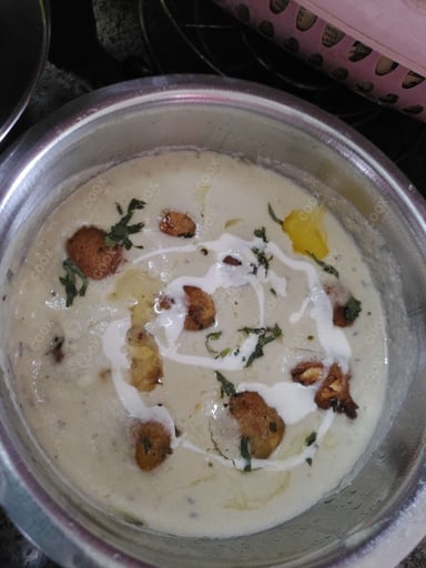 Tasty Malai Kofta (White Gravy) cooked by COOX chefs cooks during occasions parties events at home